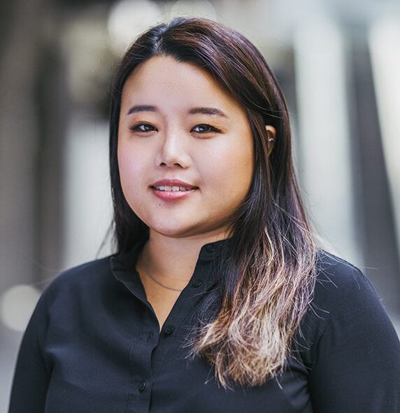 Headshot for Gee Park. She is wearing a black blouse.