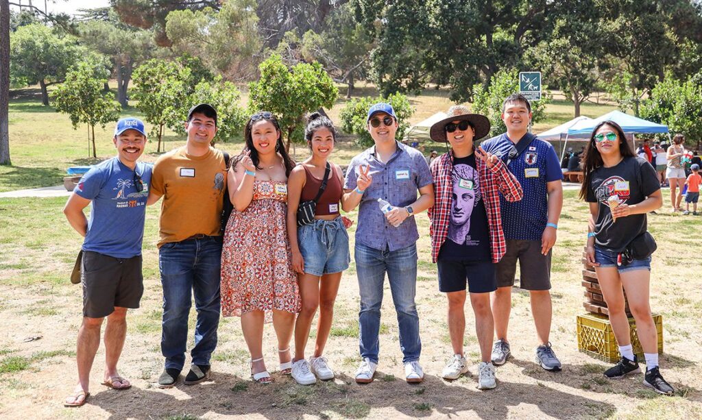 Group of people at an outdoors summer picnic